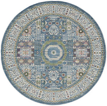 Close-up of the round Nourison Ankara Global rug. Ivory and light blue bohemian pattern with chestnut accents.