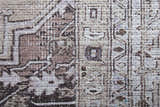 Close up of the Feizy Percy Tan/Ivory/Gray Area Rug showing the transitional medallion pattern and woven texture. Texture