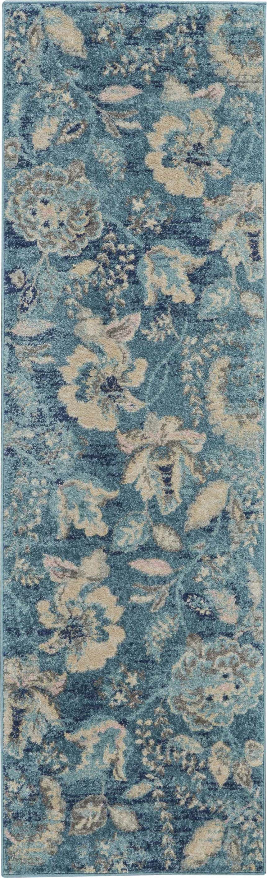Close-up of Nourison Tranquil Turquoise Vintage rug. Aqua blue with beige floral pattern and vintage style.