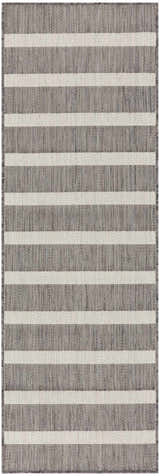 Close-up of the textured Nourison Positano Charcoal Ivory rug with horizontal taupe and ivory stripes.