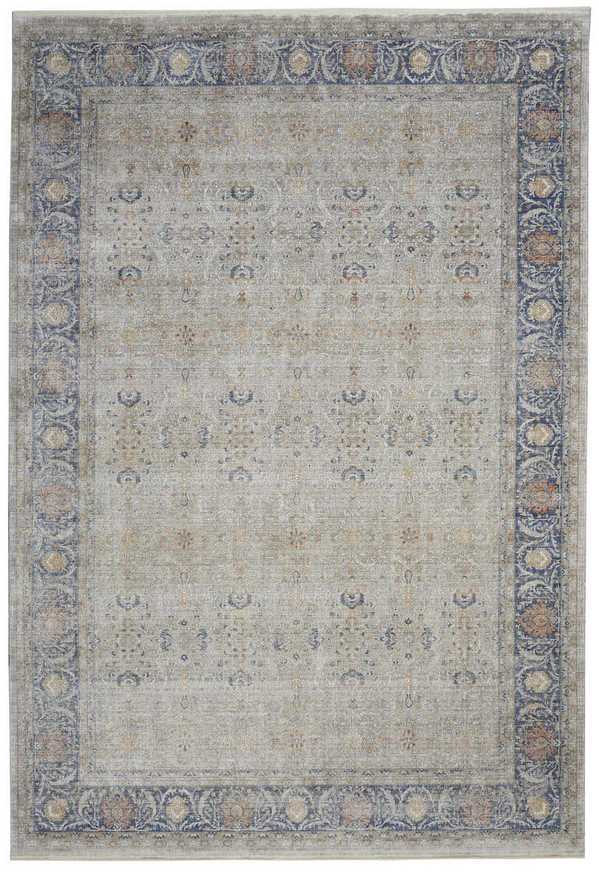 Close-up of the Nourison Starry Nights Grey Vintage Area Rug featuring a floral border and distressed, intricate pattern.