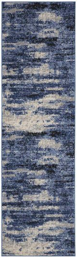 Close-up of Calvin Klein River Flow rug; blue, gray, and black abstract pattern, mid-century modern style.