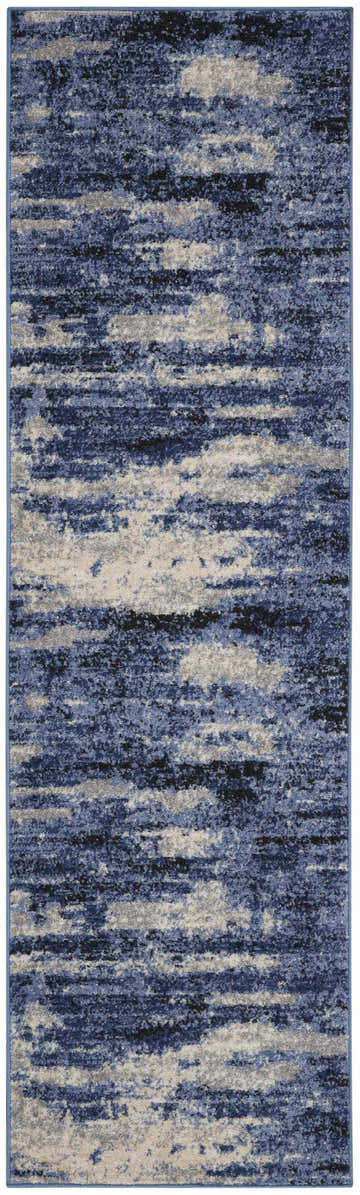 Close-up of Calvin Klein River Flow rug; blue, gray, and black abstract pattern, mid-century modern style.