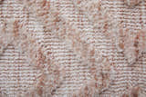 Close-up of the Feizy Colton Modern Diamond Pink/Ivory Area Rug showing texture and diamond pattern detail. Texture