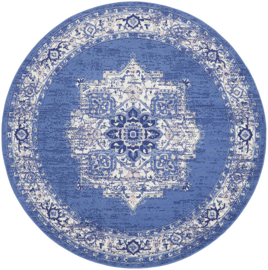 Round Nourison Whimsicle Navy Farmhouse rug featuring a central medallion and ornate border pattern.