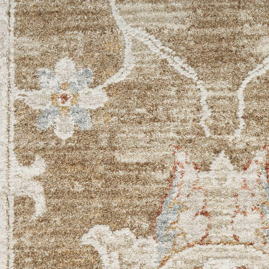 Close-up of Nourison Infinite Mocha rug showing light brown, cream, and floral vintage pattern.