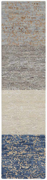 Close-up of the handmade Nourison Luna Dark Blue Mocha rug, featuring blue, mocha, ivory, and gray tones.