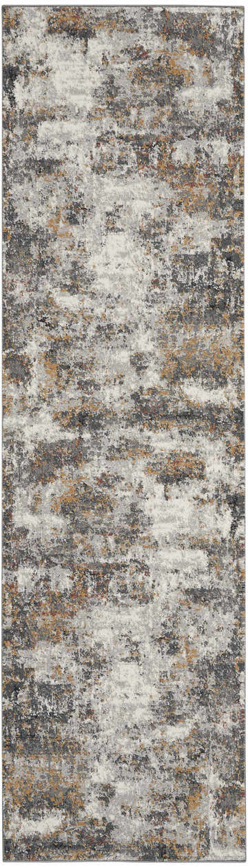 Close-up of the Nourison Tangra Grey Multicolor Rug. Abstract design with gray, white, and rust-colored accents.