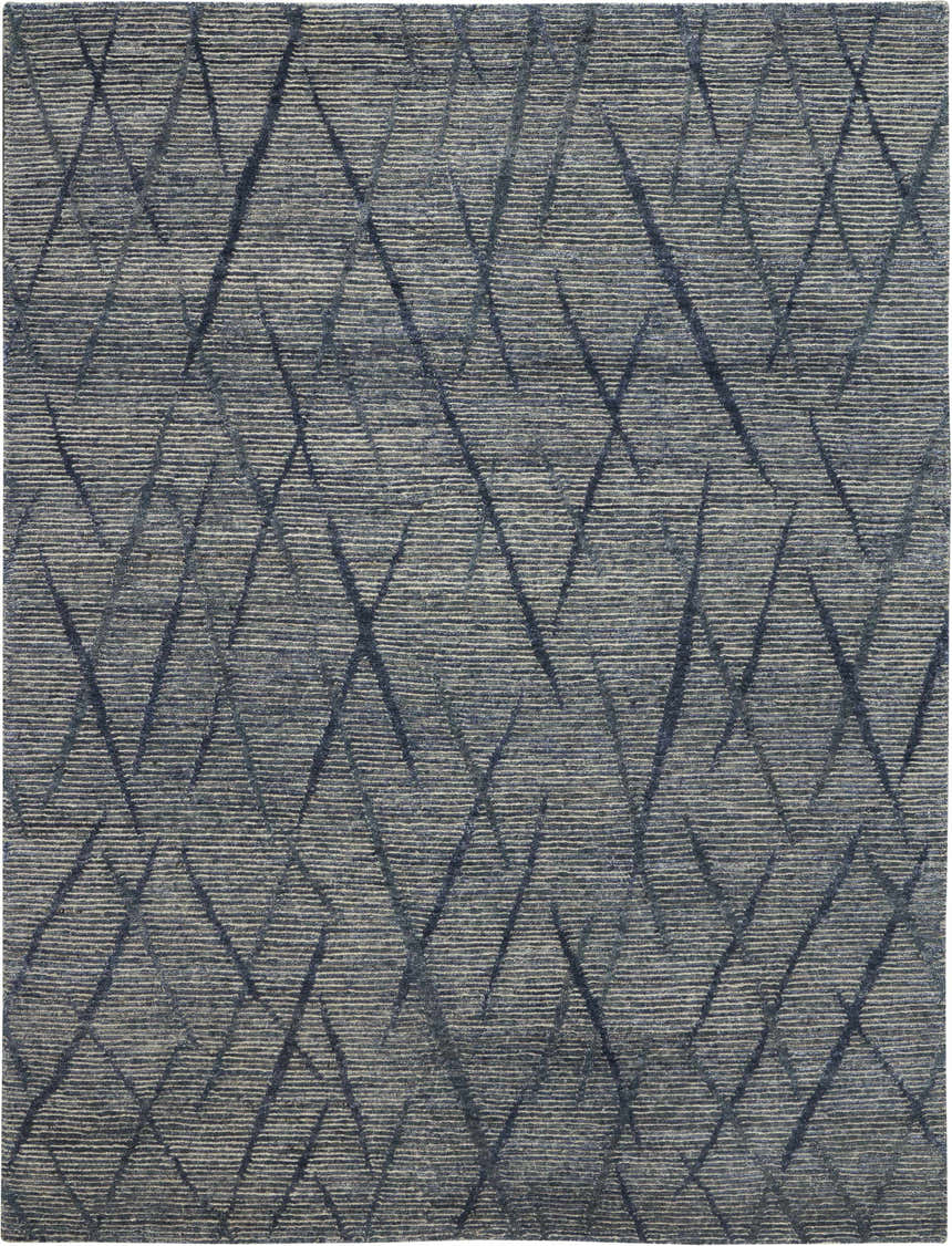 Close-up of the handmade Nourison OCEAN Indigo Area Rug, featuring a modern geometric pattern and purple hues.
