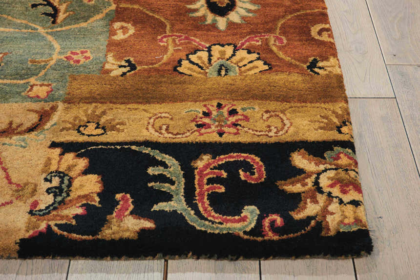 Close up of the handmade Nourison Jaipur Multicolor Persian wool rug, showing floral patterns and textures.