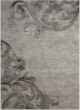 Close-up of the Nourison Maxell Graphite rug. Features a contemporary floral design in shades of gray and graphite.