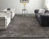Modern living room with white chairs and a gray sofa featuring the Feizy Darian Modern Solid Gray Area Rug. Roomscene-Rectangle