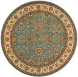 Close-up of a round Nourison Living Treasures Aqua rug. Traditional floral pattern in aqua, tan, and brown.