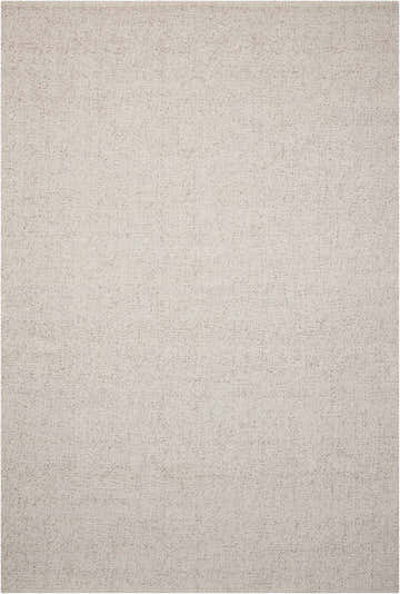 Close up of the Calvin Klein Home Tobiano Sand rug, showing its woven texture and sandstone color.