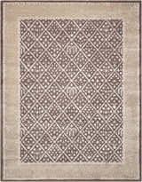Close-up of Nourison Symphony Charcoal rug, featuring a taupe floral trellis pattern and handmade construction.