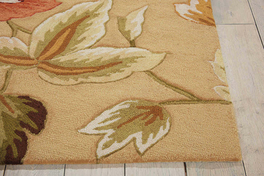 Close-up of the Nourison Fantasy Beige Rug, featuring a floral design with beige, brown, and green hues. Handmade texture.
