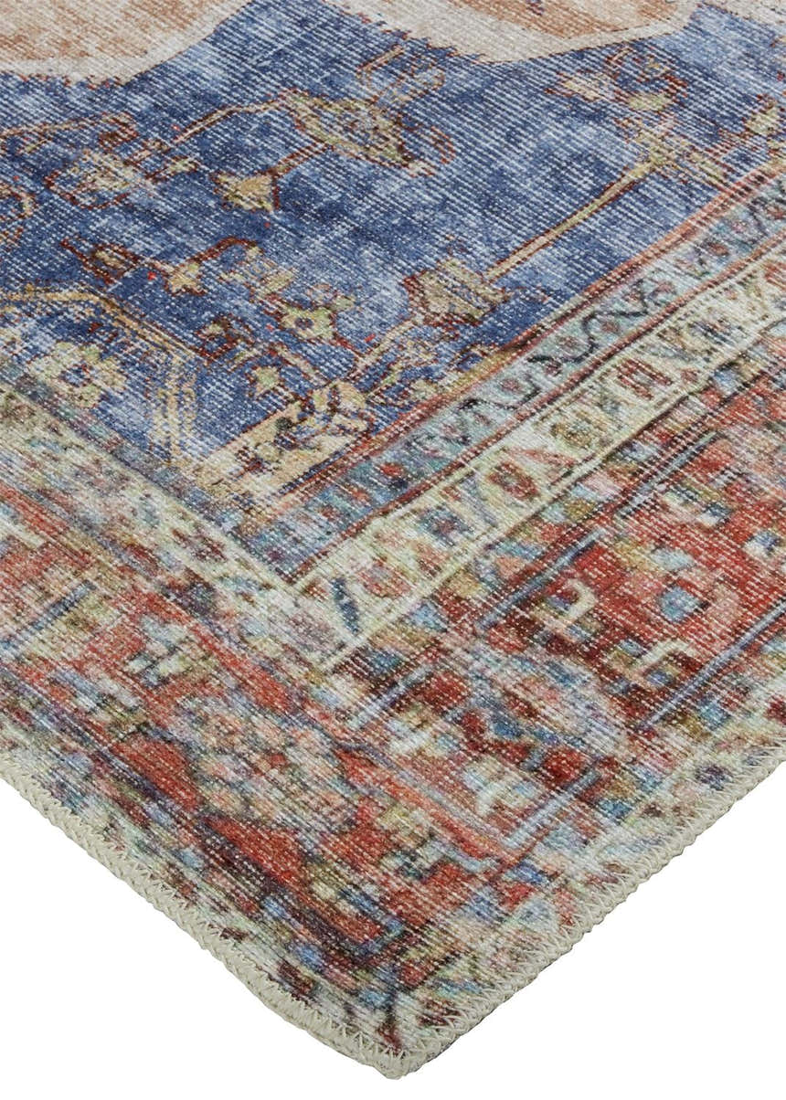 Close-up of the Feizy Percy Transitional Medallion Area Rug in red, tan, and blue. Features a detailed, distressed medallion pattern. Corner