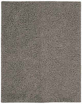 Close-up of the plush texture of the grey Nourison Zen Shag rug. Handmade polyester shag rug.
