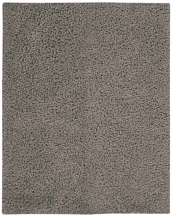 Close-up of the plush texture of the grey Nourison Zen Shag rug. Handmade polyester shag rug.