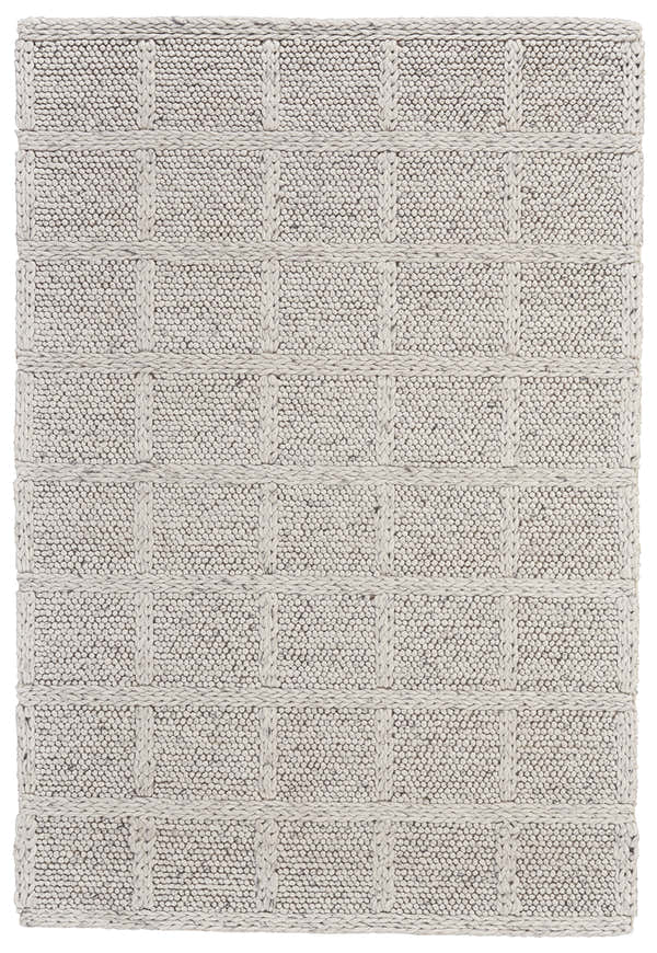 Close-up of Feizy Berkeley rug. Hand-woven wool rug with interlocking checkered texture in ivory and gray. Design-Rectangle