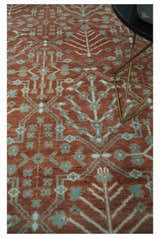 Hand knotted Multi Size Rust and Aqua Floral wool Area Rug