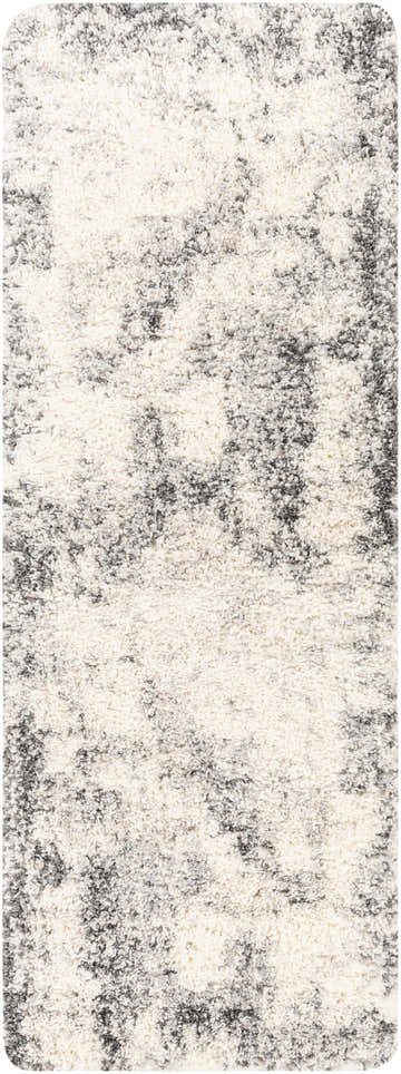 Close-up of the Hilotongan Plush Abstract Area Rug. Cream shag rug with black and gray abstract pattern. Design-Runner-2773