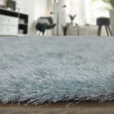 Close-up of the plush Feizy Indochine Modern Solid rug in blue and silver, showing its soft, textured pile. Pile