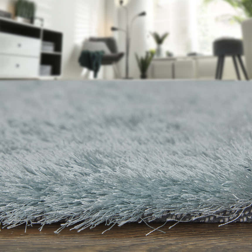 Close-up of the plush Feizy Indochine Modern Solid rug in blue and silver, showing its soft, textured pile. Pile