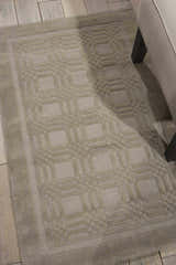 Close-up of the handmade Nourison Westport Grey rug, featuring a subtle geometric pattern and soft wool texture.