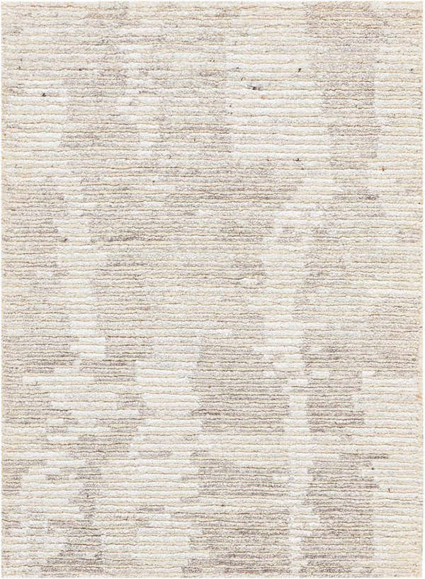 Close-up of the Nourison Ellora Ivory Grey Rug. Handmade rayon rug with a subtle geometric pattern and textured weave.
