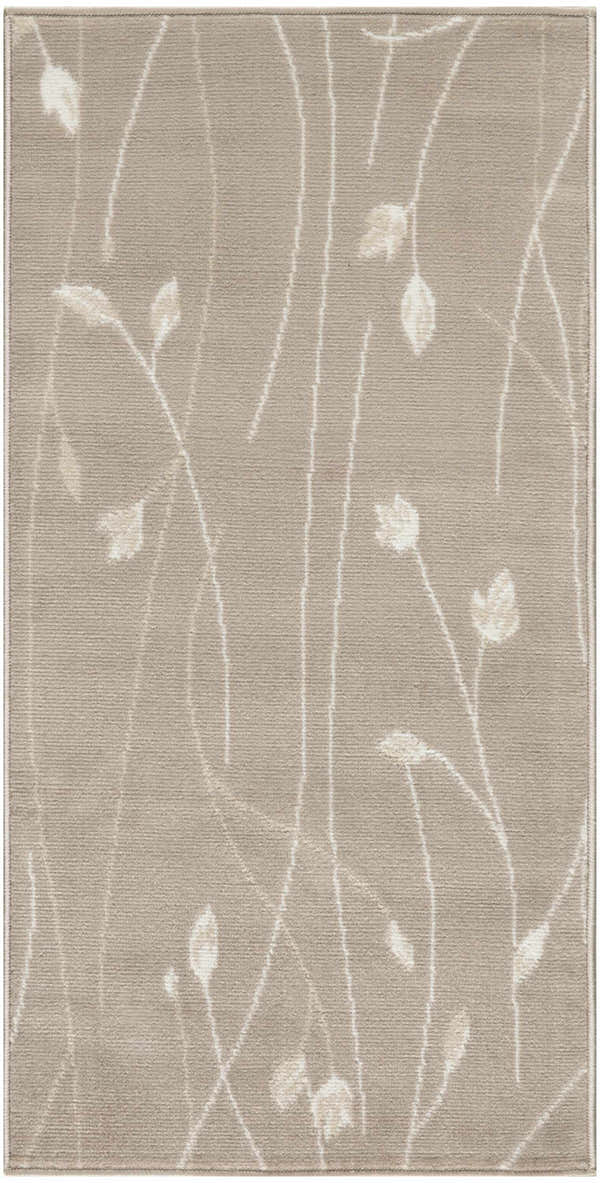 Close-up of the Nourison Grafix Beige rug showing floral pattern and soft, neutral colors.