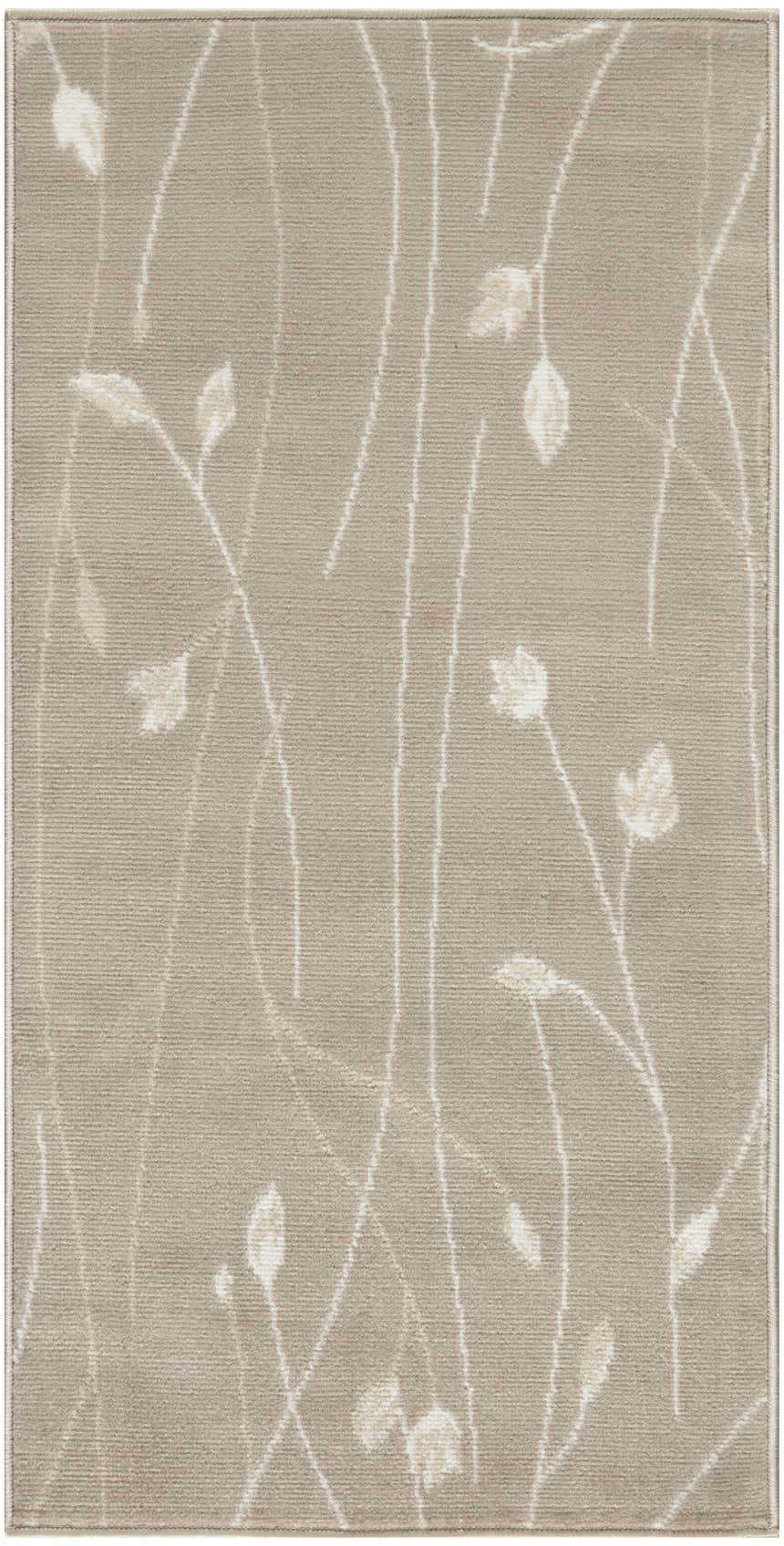 Close-up of the Nourison Grafix Beige rug showing floral pattern and soft, neutral colors.