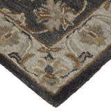Close-up of Feizy Eaton Traditional Oriental rug; blue, gray, and taupe wool with Persian-style floral pattern. Corner