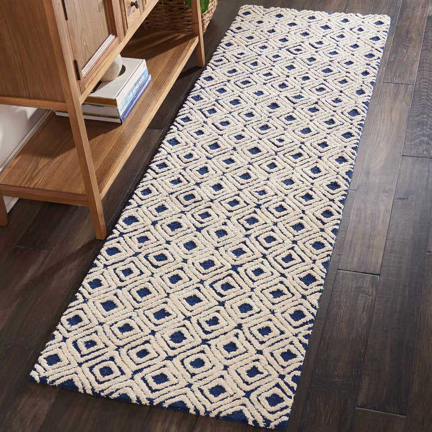 Hallway scene with Nourison Deco Mod Navy Ivory runner rug on dark wood floor.