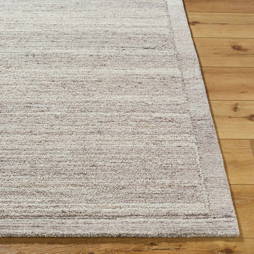 Close-up of the Blenda Beige Area Rug showing its wool texture, subtle stripes, and neutral color palette. Front