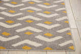 Close up of Nourison Harper Grey Colorful Indoor Area Rug with geometric pattern in gray, cream, and gold.