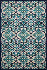 Close-up of the Nourison Aloha Navy Bohemian Area Rug featuring a geometric, floral-inspired pattern in navy and teal.