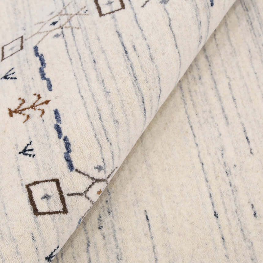 Ivory And Blue Tribal Border Design Hand Loomed Wool Area Rug
