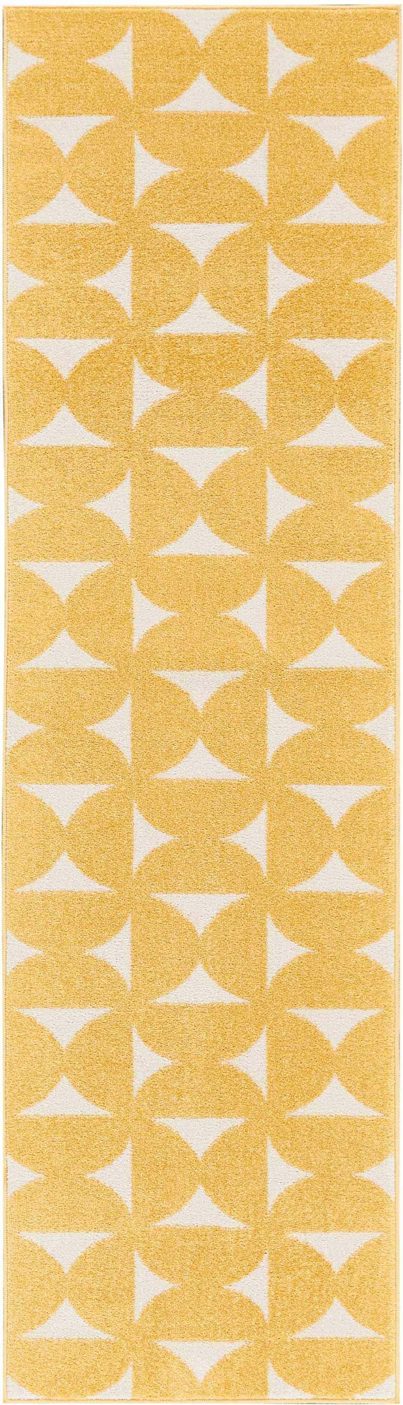 Close-up of Nourison Harper Yellow rug featuring a geometric pattern of yellow semi-circles and white triangles.