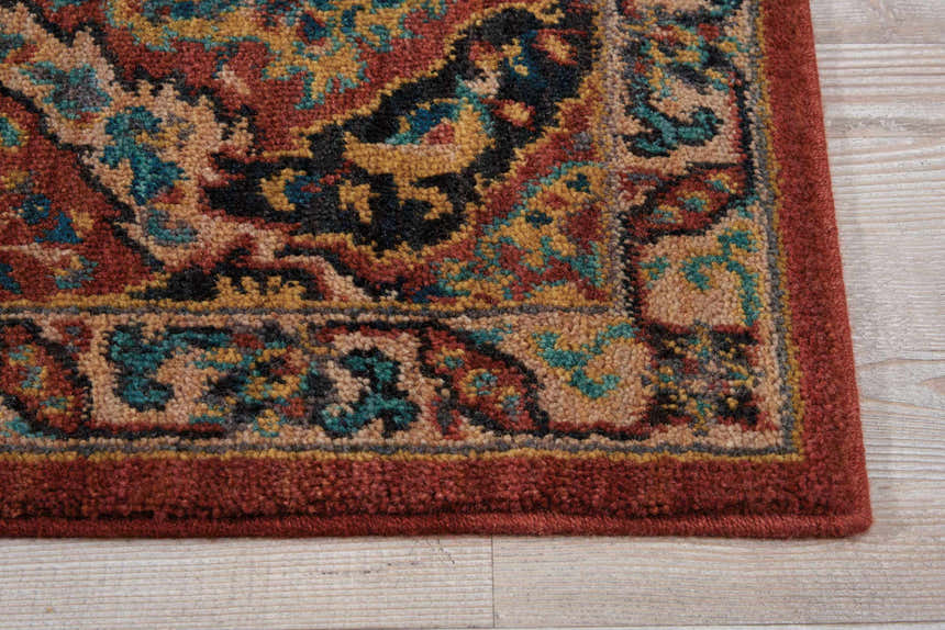 Close up of the Nourison 2020 Terracotta Rug. Traditional design with burnt orange, teal, gold, and black colors.