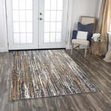 Entryway with Rizzy JAS734 area rug in beige, dark red, gray, ivory, and rust. Abstract rug on dark wood floor. Roomscene-Rectangle