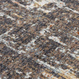 Close-up of the abstract Rizzy JAS738 area rug. Dark red, gray, and white create a textured, modern pattern. Texture