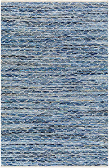 Close-up of the hand woven Gurit Blue Area Rug. Features horizontal stripes of blue, gray, and white recycled fabric. Design-Rectangle-576