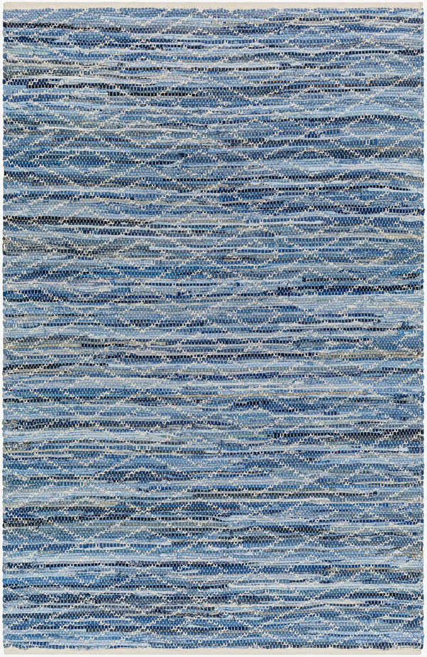 Close-up of the hand woven Gurit Blue Area Rug. Features horizontal stripes of blue, gray, and white recycled fabric. Design-Rectangle-576