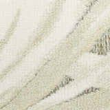 Close-up of the Nourison Aloha Ivory Sage rug showing its pile texture and abstract chestnut pattern.