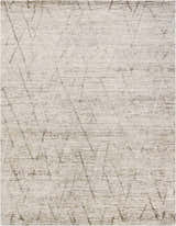 Close-up of the Nourison OCEAN Stone area rug. Sandstone color with a subtle geometric pattern and textured weave.