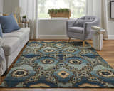 Living room scene with Feizy Amzad blue, gray, and tan wool rug, sofa, and chair. Transitional style. Roomscene-Rectangle