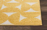 Close up of the Nourison Harper Yellow rug showing its geometric pattern and textured weave.