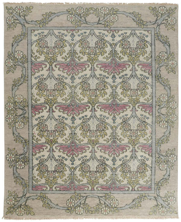 Close-up of Feizy Beall rug. Traditional floral design in ivory, pink, and green with botanical border on a hand-knotted wool rug. Design-Rectangle