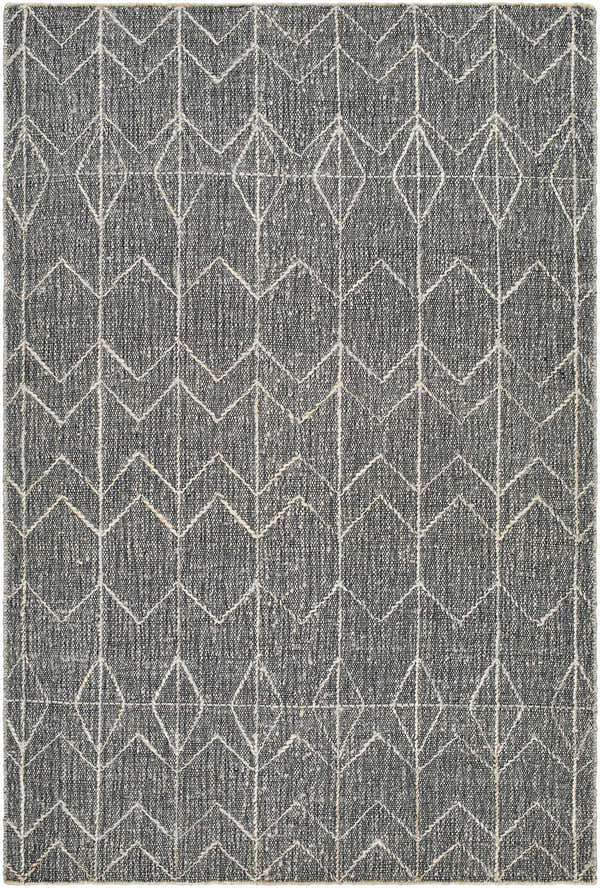 Close-up of the hand woven Kate Area Rug. Dark gray jute rug with a light gray geometric diamond pattern. Design-Rectangle-576